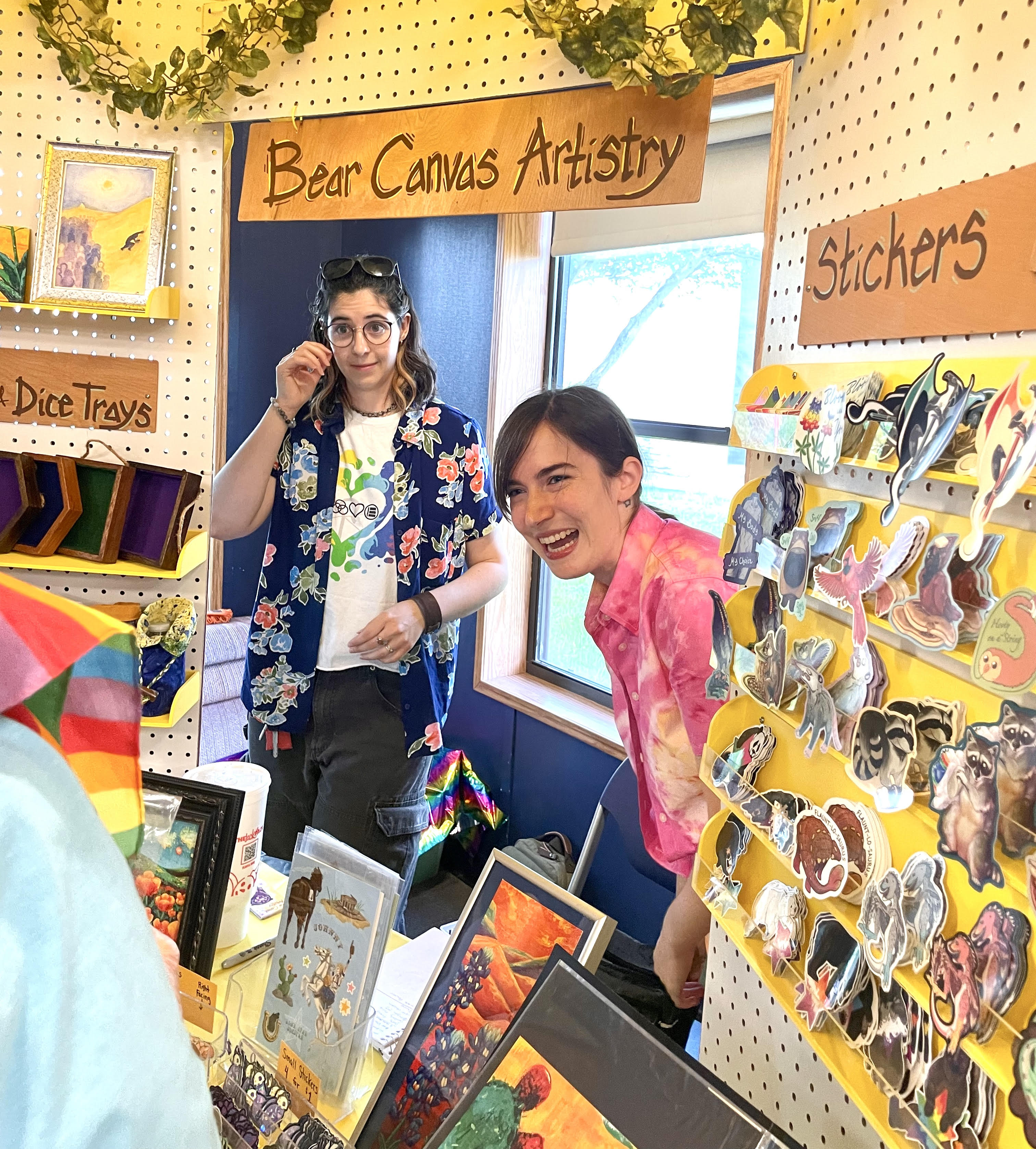 A picture of Bear Canvas Artistry's booth setup.