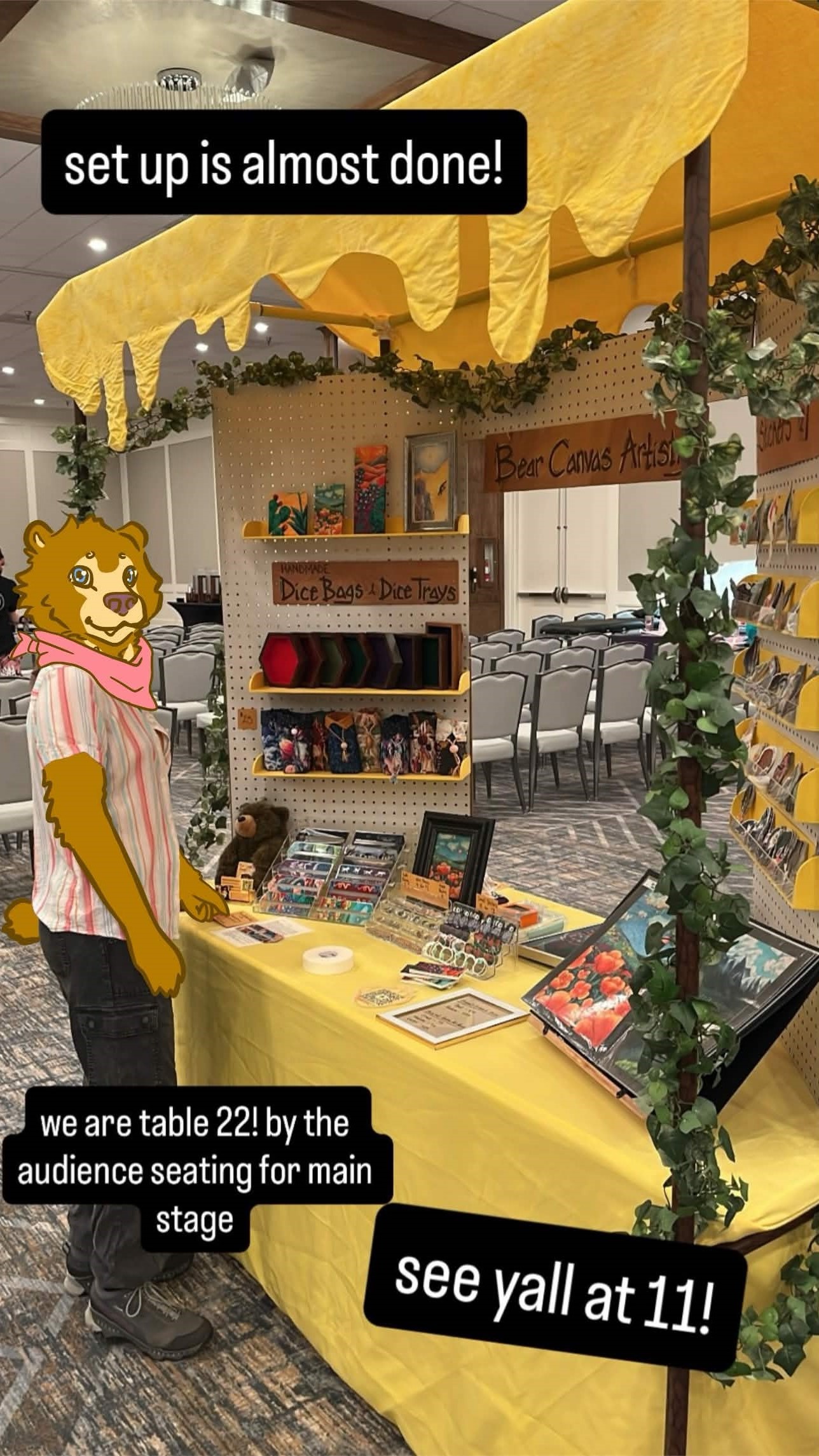 A picture of Bear Canvas Artistry's booth setup.